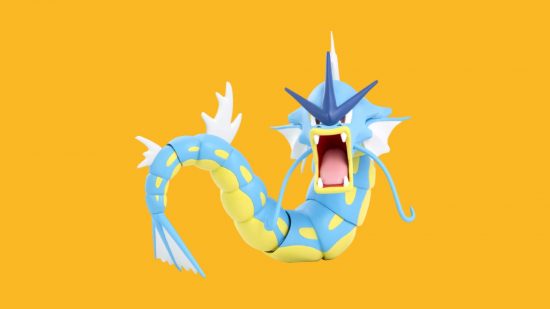 Pokémon figures: Gyarados, a long, dragon-like sea creature, blue with spiky fins and long whiskers.