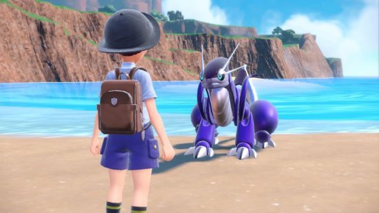 Pokémon Scarlet and Violet review - Miraidon and the trainer on the beach