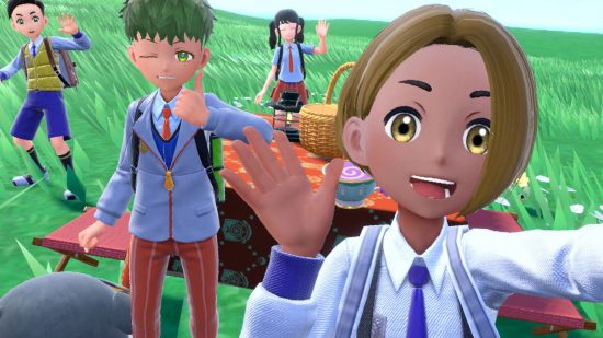 Pokémon Scarlet and Violet multiplayer: a character takes a selfie with three friends on a grassy plain with a picnic table on it. She has a bl;onde bob, grey cardigan, tie and shirt, and is waving,another gives a thumbs up and a wink, further back a black pig-tailed girl waves, while another boy strikes a funny pose.