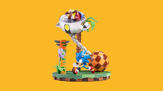 Sonic figures: Sonic is a blue hedgehog, with red shoes and white gloves. Here, he is running along a grassy platform with Dr. Eggman, a red-garbed moustachioed rotund man in a flying saucer type ship.