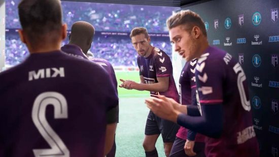 FM23 wonderkids: a bunch of footbal players encouraging each other as they walk out the tunnel onto the pitch in their purple football kits.