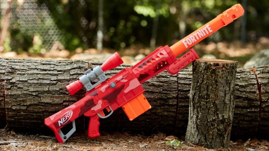 Fornite Nerf gun SR Heavy blaster leaning against a log