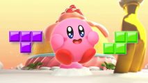 Kirby's Dream Buffet Tetris 99: A background of a giant cake from Kirby's Dream Buffet. On top of it is Kirby looking super happy with wide eyes at a purple T shaped Tetrimino and a green S shaped Tetrimino
