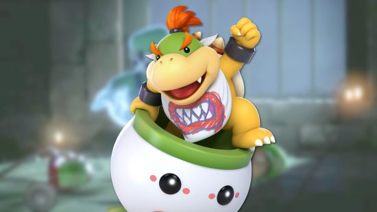 Mario character Bowser Jr, a small tortoise with a fierce look in hovercraft with a smily face on it. Also he is wearing a bib with teeth drawn on it