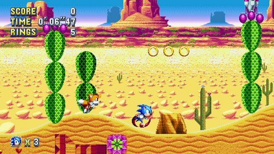 Best Sonic games: A screenshot of Sonic Mania Plus showing Sonic and Tails on a desert level.