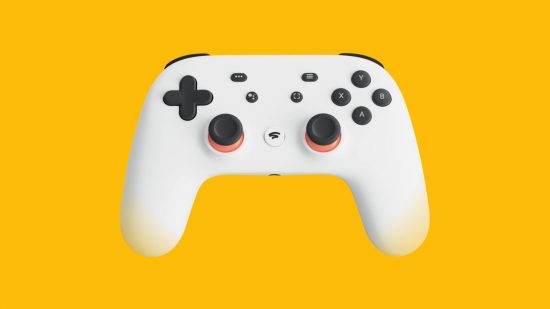 Google Stadia controller Bluetooth - a white controller on a mango yellow background with symmetrical sticks, four face buttons and a full D-pad, and multiple smaller buttons in the middle.