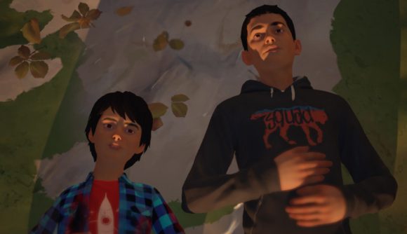 Life is Strange 2 review: Sean and Daniel Diaz, two Hispanic young boys, laying next to each other on a grey rock dapled with autumn leaves. Sean is on the right and wears a black hoodie with a red picture of a wolf that says 'squad', and Daniel wears a blue plaid shirt stained with fake blood over a red tshirt with a rocket on it.