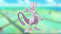 Pokemon GO Mewtwo: key art shows the psychic Pokemon Mewtwo stood against the Pokemon Go background