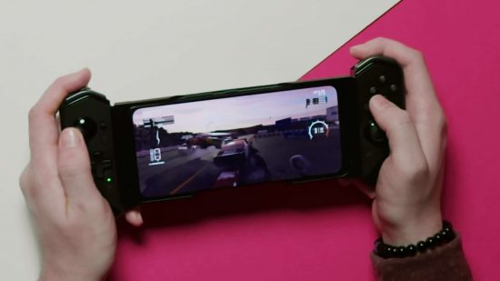 A person playing Wreckfest on a ROG Phone 6