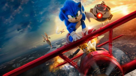 Sonic wallpaper: promotional art for the Sonic Movie shows Sonic on the wing of a red plane being flown by Tails