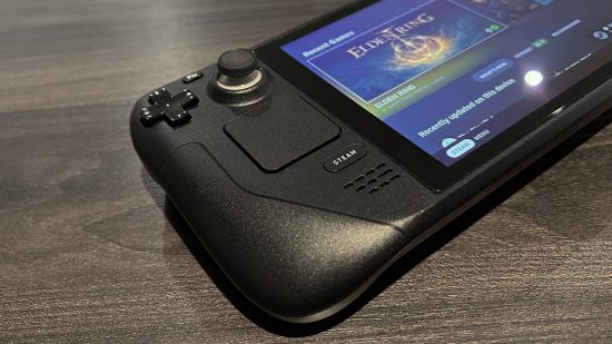 Steam Deck review - The left touchpad of a Steam Deck with Elden Ring playing on the side