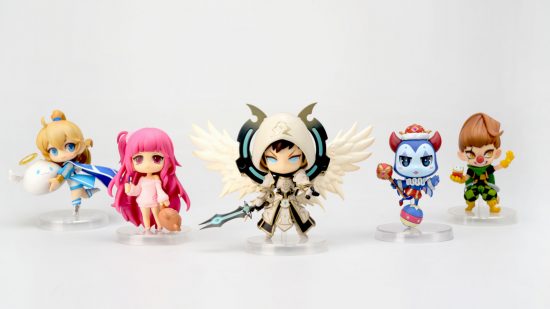 Summoners War Merch - a group of chibi style figurines