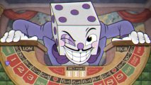 Cuphead King Dice leaning over the wall of his boss fight