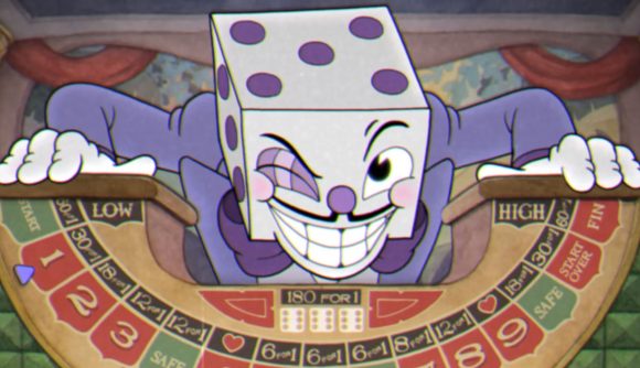 Cuphead King Dice leaning over the wall of his boss fight
