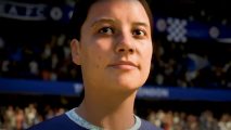 FIFA 23 Switch header showing a woman from the reveal trailer, a closeup of her face, hair in a ponytail, background showing a blurry crowd in the stands.