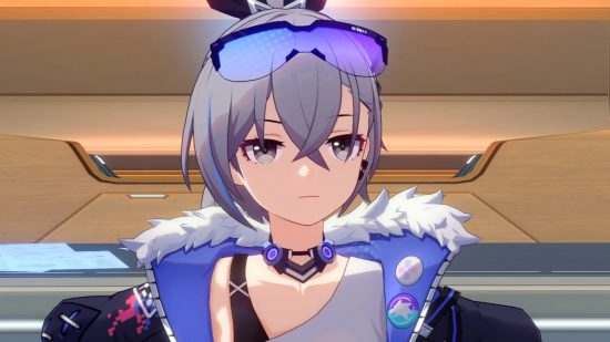 Honkai Star Rail's Silver Wolf standing with her hands on her hips and a serious expression on her face.