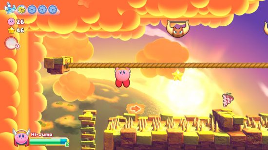 Kirby’s Return to Dream Land Deluxe review - Kirby shimmying along a rope over spikes