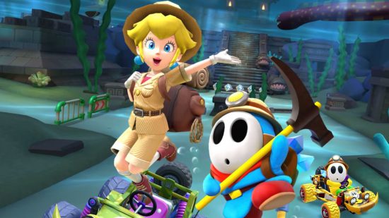Screenshot form the Mario Kart Tour exploration tour trailer with Peach and a Shy-Guy jumping in delight