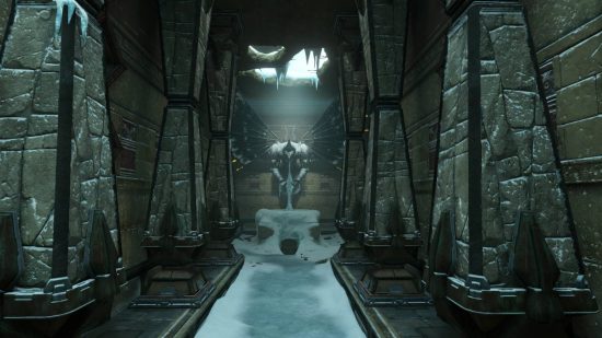 Metroid Prime Remastered review: a screenshot from Metroid Prime Remastered shows a long hallway leading to a statue of a chozo