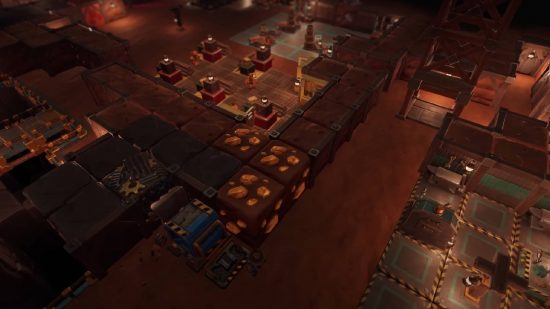 SteamWorld Build Interview: a screenshot from SteamWorld Build shows a small desert town filled with buildings and bustling with steam powered robots