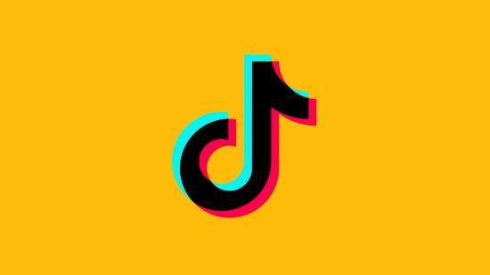 What is TikTok - the TikTok logo on a mango yellow background. It looks like a musical notation quaver, but also like a T.