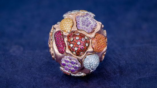 Candy Crush competition ring designed by Icebox, diamond encrusted and gold with purple and blue baubles.