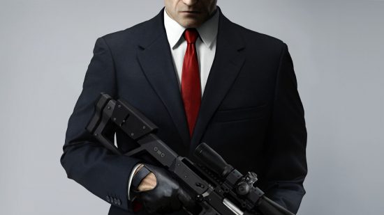 FPS games - a man in a black suit, red tie, white shirt, holding a sniper rifle facing straight forward, face cut off by the frame.