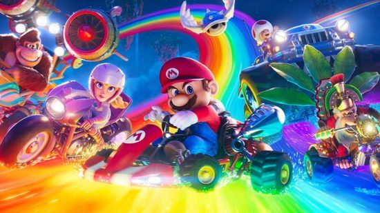 Mario movie screenshot showing various characters in karts riding on a rainbow in space. In the middle is Mario, a man in a red hat and shirt, white gloves and blue dungarees, with a big nose and bushy moustache, sat in a red gokart. Next to him is Peach, a woman in a pink spacesuit, and Donkey Kong, a monkey.