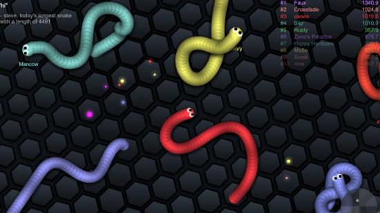 Snake games: A screenshot from Slither.io showing various colourful snakes on a black background.