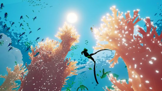 gry o dzikiej przyrodzie abzu: nurek otoczony koralowcami i rybami