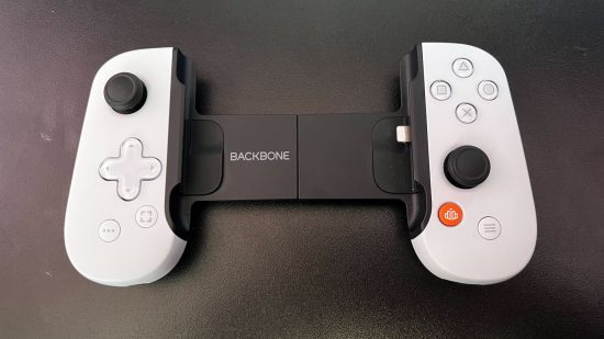 Backbone PlayStation Edition review - the device on top of a black desk