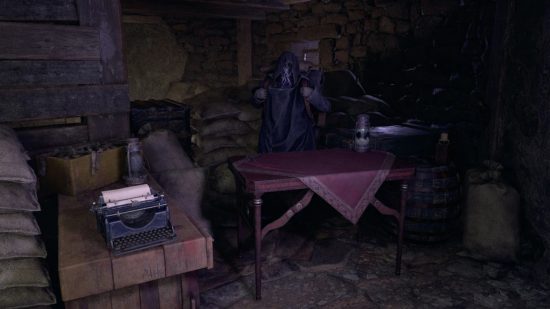 Resident Evil 4's Merchant stood behind a table next to a type writer