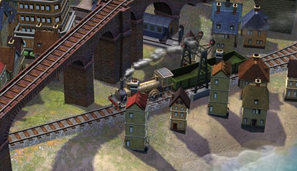 Sid Meier's Railroads review -- a train with smoke billowing out the top powers through a miniature town past a railway bridge and under it.