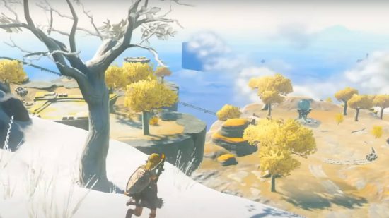 Zelda Tears of the Kingdom trailer breakdown: Link overlooks an area with rails, carts, and a large orb