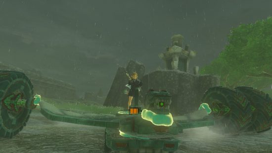 Screenshot of a custom made Zelda: Tears of the Kingdom vehicle with two big wheels and a fire shooting Zonai device
