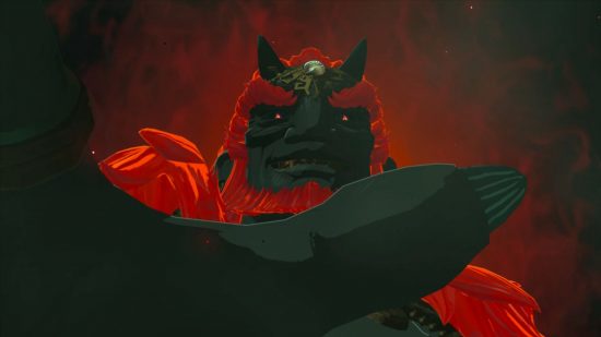A close up of Zelda Tears of the Kingdom ganondorf on a dark background reaching toward the camera