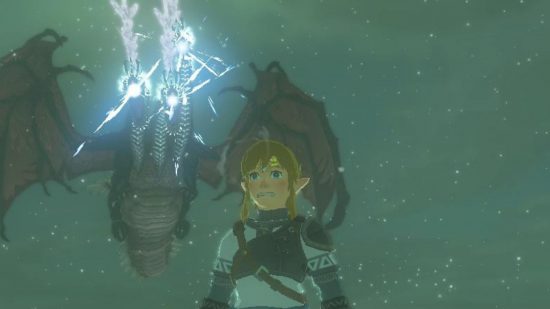 Zelda Tears of the Kingdom gleeoks - Link, a blonde boy in a circlet and white tunic standing in front of a frost breething dragon with three heads.