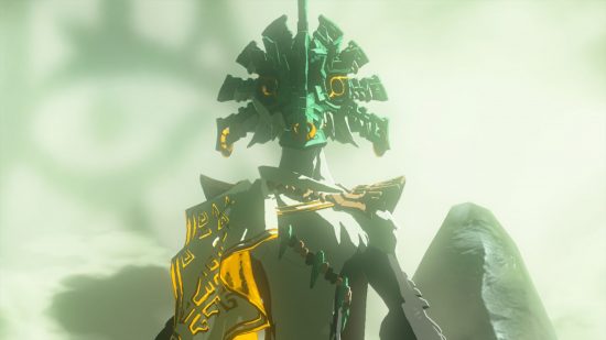 Zelda: Tears of the Kingdom sage's wills - a bird creature with an ornate, almost stony green mask on wearing a sort of yellow tunic over its chest, stands upright and faceless in a cloudy, almost dreamlike scene.