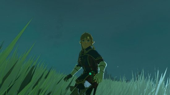 Zelda: Tears of the Kingdom shield surf - Link, a blond boy in old fashioned guards armour surfing on his shield own a grassy hill at night.