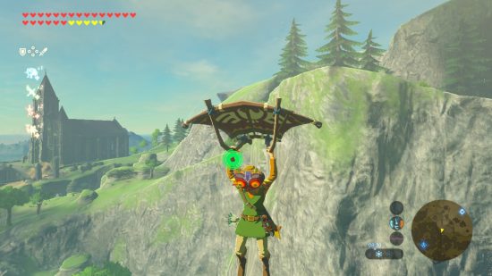 The Legend of Zelda: Breath of the Wild review image showing Link gliding in his classic tunic and Majora's Mask.