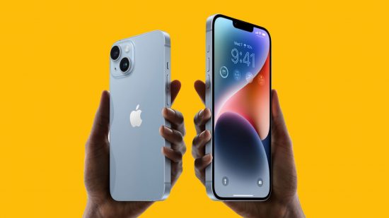 iPhone trade-in value header showing two hands on a mango yellow background holding an iPhone 14 and iPhone 14 Plus aloft. On the right is the bigger one, the plus, in blue, facing forward, with a blue and red abstract background on its screen and widgets below the time at the top. On the left is the smaller one, also in blue, with back facing us. It has the Apple logo centred, and a square camera bump in the top left corner with two cameras diagonally opposite within the square.