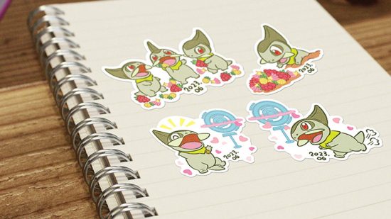 Pokemon Go community day - a sticker sheet covered in different images of Axew