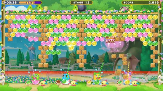 Puzzle Bobble Everybubble review: dragons shoot bubbles upwards into a grid of multicolour bubbles