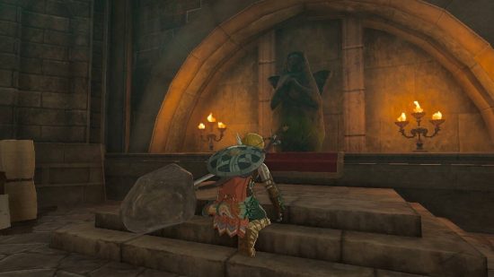 The Legend of Zelda: Tears of the Kingdom Lookout Landing: Link kneels down in front of a goddess statue
