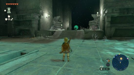 Zelda: Tears of the Kingdom autobuild: Link stands in the middle of some ruins in a dark cave, with a glowing green light in front of him