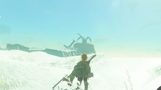 Zelda: Tears of the Kingdom glee - a three headed dragon - standing on a large rocky boulder in the land in the distance, across tundra from Link, a blonde boy with a shield and weapon his back, looking away from us.