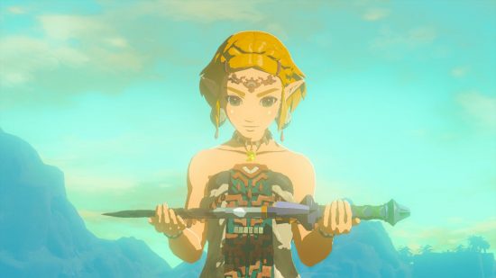 Zelda Tears of the Kingdom review - Zelda, a blonde woman with a tiara and green and white outfit, holding a purple sword, looking at it. The sky behind is cloudy green and blue.
