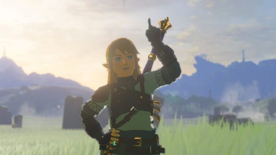 Zelda: Tears of the Kingdom weapons - Link, a blonde boy in a white tunic raising one finger aloft and looking jovial in a bucolic scene of grass fields and faraway mountains.