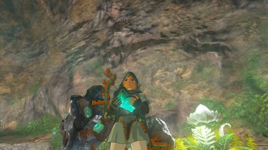 Zelda: Tears of the Kingdom zonaite: Link holds zonaite while stood next to a zonaite deposit