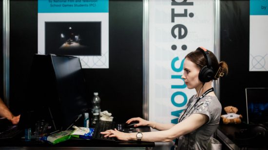 Photo of someone playing a game at the Develop:Brighton indie showcase finalists booth